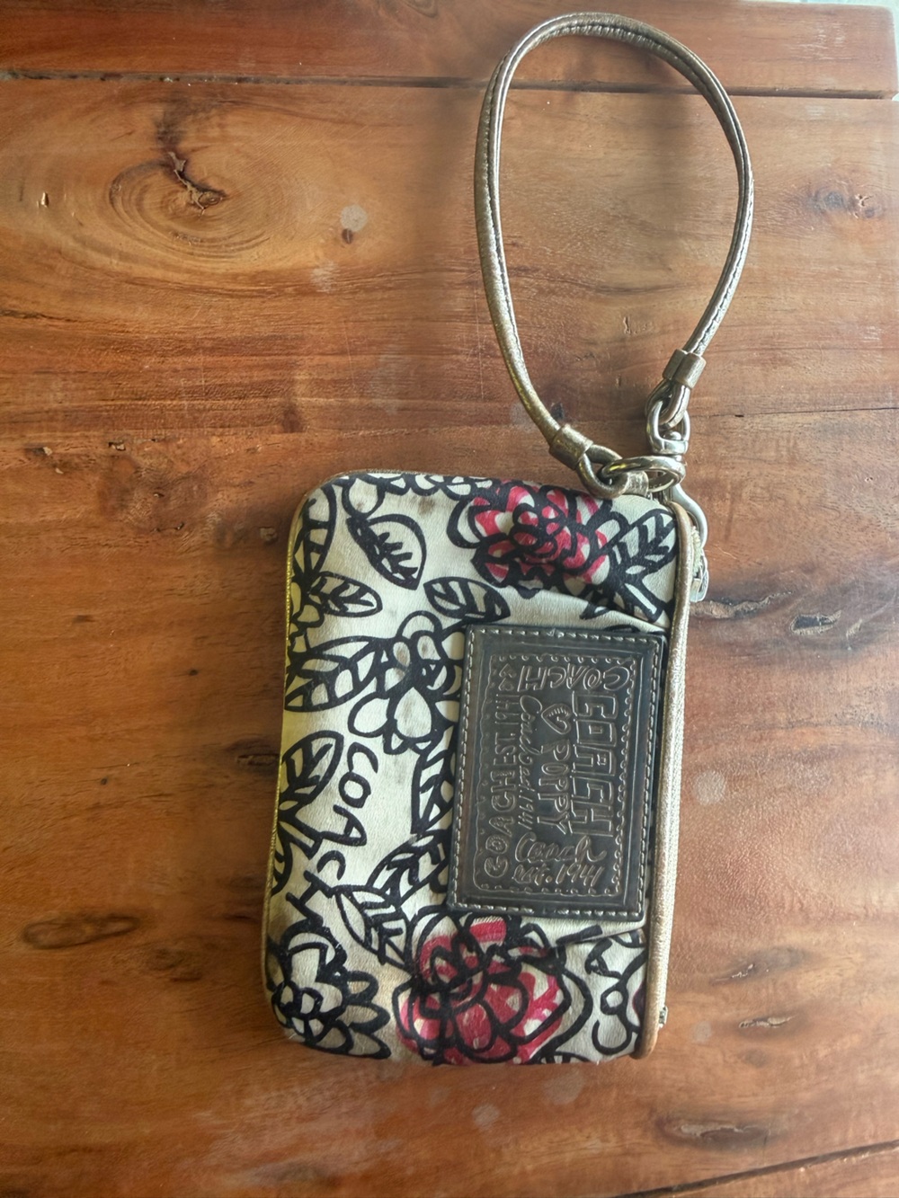 Coach Metallic Cream Floral Wristlet with Pink Accents